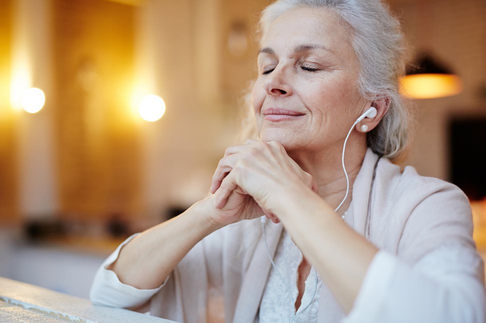 Older lady listening to music