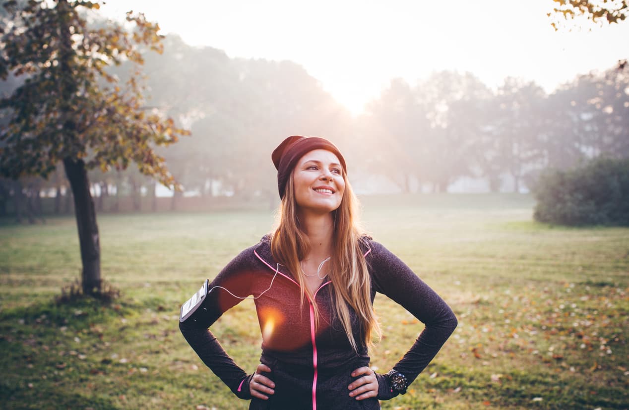 Woman standing in park after a run