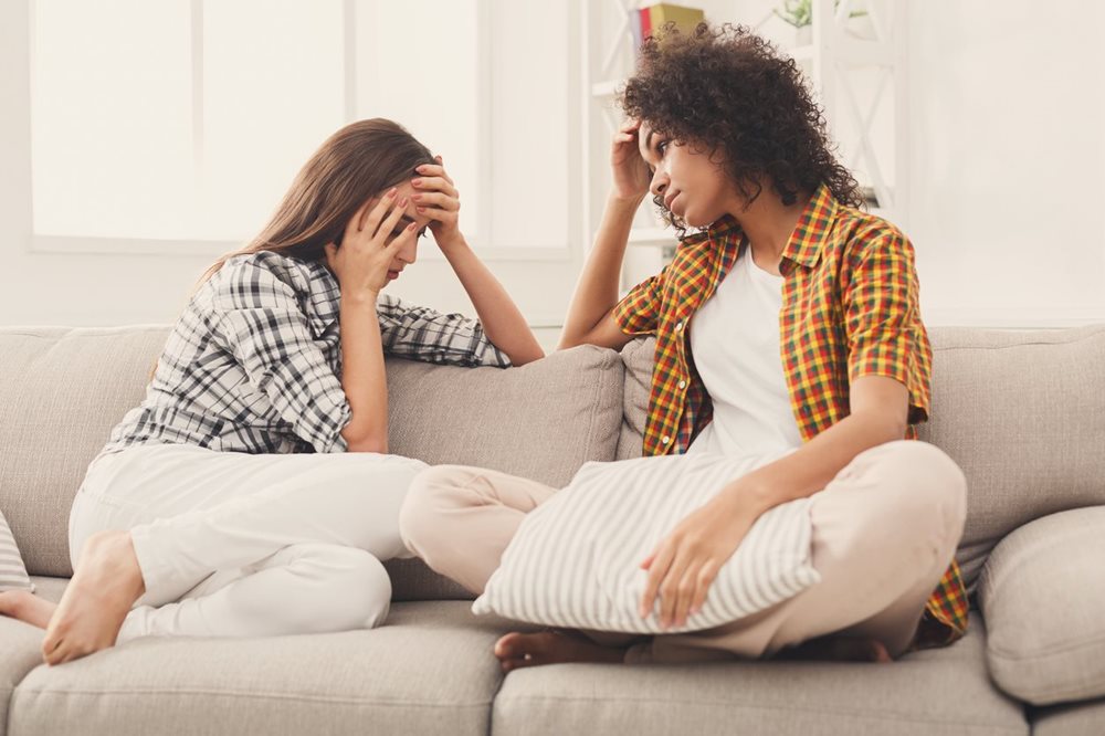 Woman opening up to her friend about anxiety